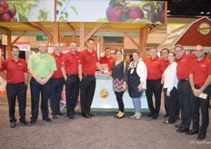 A happy team at Domex Superfresh Growers with Nosh & Nourish in the middle preparing delicious Autumn Glory apple recipes.